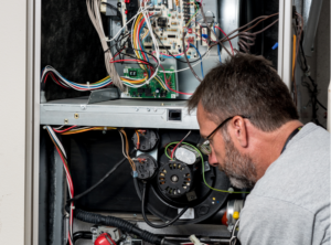 A professional working on a furnace upgrade for a home in Philadelphia, PA